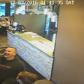 Kabobgy - a man sitting at a table in a restaurant - Middle Eastern Near Me - Windsor, Ontario
