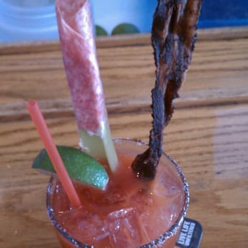 Jimmy Bones - Bloody Mary w peppered bacon and salami cream cheese celery. - Sports Bars Near Me - Orange, California