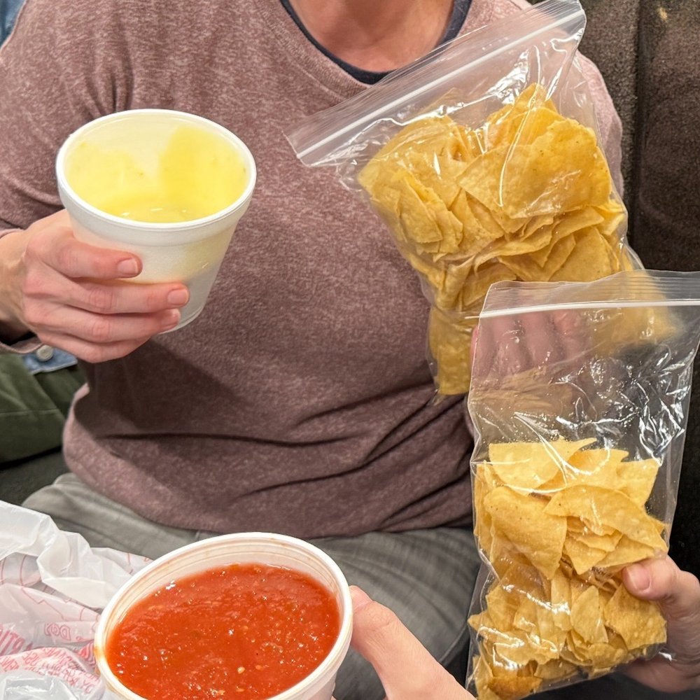 Nachos with cheese and salsa dip. Nachos with cheese and salsa dip.