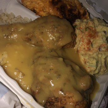 Carolina Kitchen - Smothered chicken with Mac n cheese and potato salad. I did the rice instead of mash potatoes that it is normally served with. - Soul Food Near Me - Brandywine, Maryland