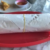 Photo of NG Cafe - Austin, TX, United States. Banh mi lovingly wrapped and delivered to your table