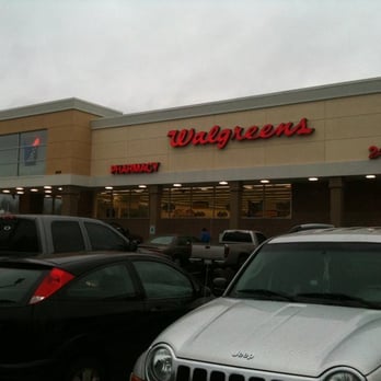 Walgreens - cars parked in front of a walgreens store - Drugstores Near Me - Olympia, Washington