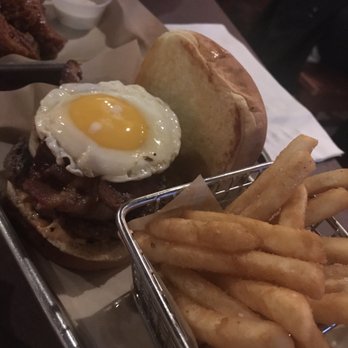 The Barrel Room - Bison bacon burger with sautéed onions, mushroom, chipotle mayo topped with fried egg on brioche bun. - Bars Near Me - Enterprise, Alabama The Barrel Room - Bison bacon burger with sautéed onions, mushroom, chipotle mayo topped with fried egg on brioche bun. - Bars Near Me - Enterprise, Alabama
