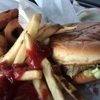 The Burger Barn - Cheeseburger with grilled onions, fries and extra order of onion rings. - Burgers Near Me - Hebbronville, Texas The Burger Barn - Cheeseburger with grilled onions, fries and extra order of onion rings. - Burgers Near Me - Hebbronville, Texas