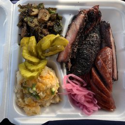 Pork rib, brisket, sausage, loaded mashed and Brussel sprouts.