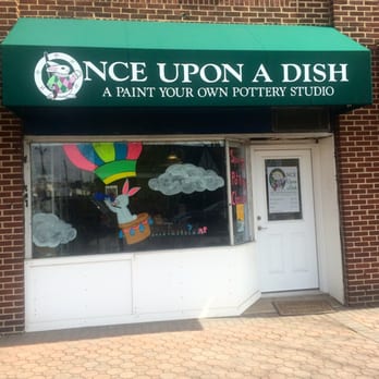 Once Upon A Dish - Storefront, with an ever-changing fun window design! - Paint-Your-Own Pottery Near Me - Garden City, New York