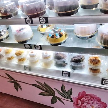 Olenka Peruvian Bistro - Display case with cakes - Bakeries Near Me - Weston, Florida