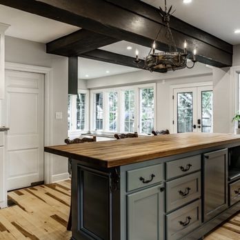 Palma Painting - Every inch of this home got worked from bare wood to perfection. Even this kitchen island was worked to perfection. Looks just like glass - Painters Near Me