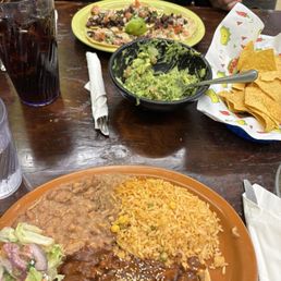 Mole, elk tacos, and chips with guacamole Mole, elk tacos, and chips with guacamole