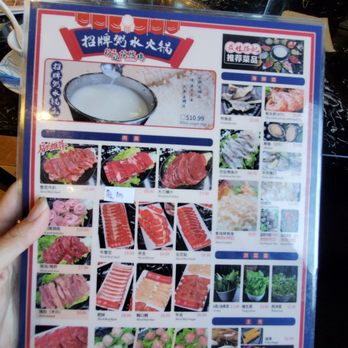 Hong Kong Seafood Hotpot - a hand holding a menu - Seafood Near Me - Toronto, Ontario Hong Kong Seafood Hotpot - a hand holding a menu - Seafood Near Me - Toronto, Ontario