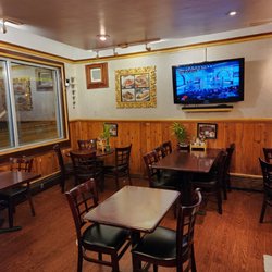 Thai Bar-B-Que Restaurant - "Family Feud" which is sone Thai television show, and soporofic smooth jazz. Ugh.