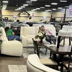 Mega Furniture - How the employees just put there feet on the furniture and not even work