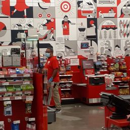 Interior view, masked employee, single line spacing, etc Interior view, masked employee, single line spacing, etc