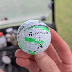 TaylorMade SpeedSoft Ink Golf Balls. High contrast, soft feel. $24.99 per pack.