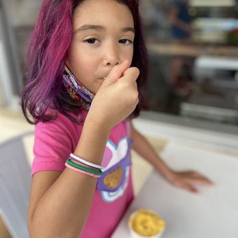 Miya Bowls - Enjoying her mango - Acai Bowls Near Me - Wahiawa, Hawaii Miya Bowls - Enjoying her mango - Acai Bowls Near Me - Wahiawa, Hawaii