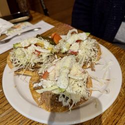 Ruby's Mexican Restaurant - Tostados with barbacoa. Generous portions.