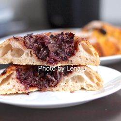 The Cheeseboard Collective - Inside of Onion and Poppy Seed Bialy ($3.25) - bread it chewy and tasty. Filling is a bit too oily for me.