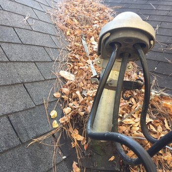 Gateway Roofing - This electrical pipe is located in a valley, not good. - Roofing Near Me - Dallas, Texas Gateway Roofing - This electrical pipe is located in a valley, not good. - Roofing Near Me - Dallas, Texas
