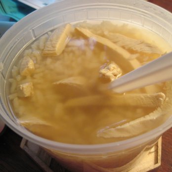 Crown Palace - Some scattered pieces of chicken in the Chicken and Rice soup. - Dim Sum Near Me - Marlboro, New Jersey