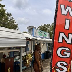 NautiTime Seafood n Wing Shak - Unique stylings of Nauti Time