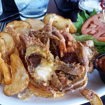 The Lighthouse Restaurant & Dock Bar - Double soft shell crab sandwich with home fried chips - Bars Near Me - Solomons, Maryland The Lighthouse Restaurant & Dock Bar - Double soft shell crab sandwich with home fried chips - Bars Near Me - Solomons, Maryland