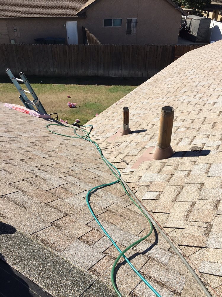 Slide of Thompson Roofing