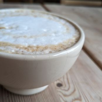Le Pain Quotidien - A close up shot of the latte - Bakeries Near Me - Fairfax, Virginia Le Pain Quotidien - A close up shot of the latte - Bakeries Near Me - Fairfax, Virginia