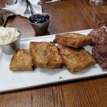 Scratch - Bread pudding french toast w flavored whip cream, berries and sausage. - Breakfast & Brunch Near Me - Independence, Ohio