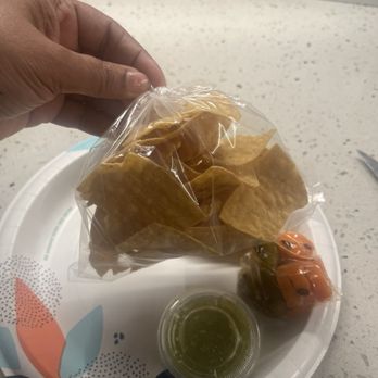 The Burrito Truck - Chips, salsa, and jalapeño and carrots they give you. It was good but pretty skimpy on the jalapeños. I believe I only got one. - Food Trucks Near Me - Oakland, California