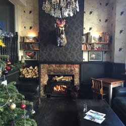 The Black Pig Pub & Dining Room - Cozy fire..
