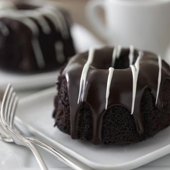 H BAR - a chocolate bundt cake on a white plate - American Near Me - San Diego, California H BAR - a chocolate bundt cake on a white plate - American Near Me - San Diego, California