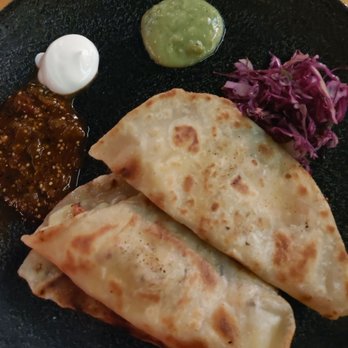 Chico Malo - QUESADILLA w/ red bird farms chicken (house made hayden mills flour tortilla queso mexicano + 4 chile salsa) crema + salsa cruda - Mexican Near Me - Phoenix, Arizona Chico Malo - QUESADILLA w/ red bird farms chicken (house made hayden mills flour tortilla queso mexicano + 4 chile salsa) crema + salsa cruda - Mexican Near Me - Phoenix, Arizona