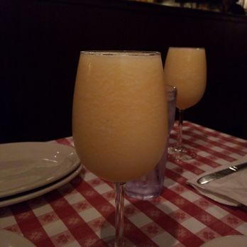 Buca di Beppo Italian Restaurant - Frozen peach bellini - Italian Near Me - Redondo Beach, California Buca di Beppo Italian Restaurant - Frozen peach bellini - Italian Near Me - Redondo Beach, California