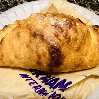 Superkhana International - Butter Chicken Calzone - Indian Near Me - Chicago, Illinois Superkhana International - Butter Chicken Calzone - Indian Near Me - Chicago, Illinois