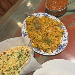 Kashmiri Masala, chicken biryani, garlic naan Kashmiri Masala, chicken biryani, garlic naan