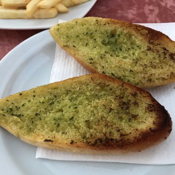 Restaurant Valentino - Garlic bread. Totally fine. Probably didn't need to order it. - Modern European Near Me - Arguineguin, GC