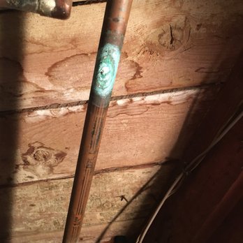 LA Plumbing and Builders - a copper pipe with a green sticker on it - Plumbing Near Me - Van Nuys, California