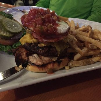 The Village Idiot - The kitchen sink burger - American Near Me - Revelstoke, British Columbia The Village Idiot - The kitchen sink burger - American Near Me - Revelstoke, British Columbia
