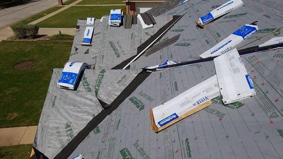 Slide of Cowtown Roofing