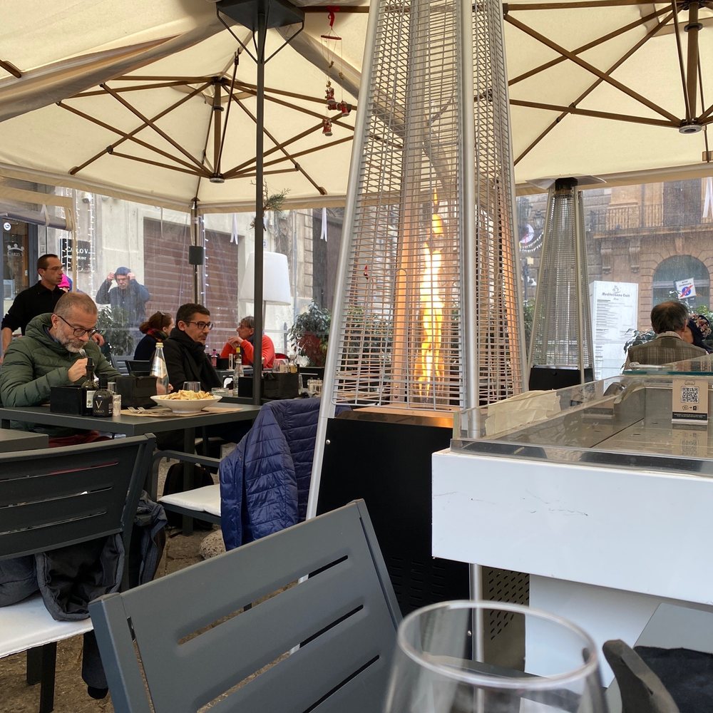 Outside seating with heaters.