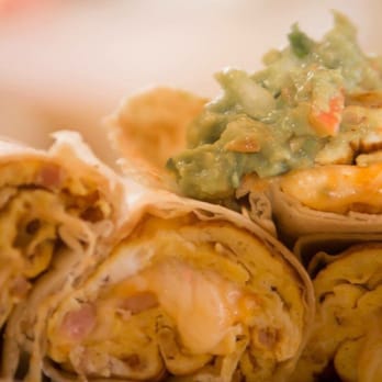 Las Cazuelas - a plate of burritos with guacamole - Mexican Near Me - Detroit, Michigan Las Cazuelas - a plate of burritos with guacamole - Mexican Near Me - Detroit, Michigan