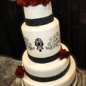 Clara's Bakery - a wedding cake with red roses - Bakeries Near Me - Winter Springs, Florida Clara's Bakery - a wedding cake with red roses - Bakeries Near Me - Winter Springs, Florida