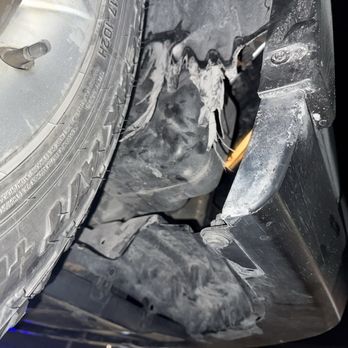 New Trimble Autobody - Because they didn't screw back the bolts, the wheel well was damaged on my drive back - Body Shops Near Me - Clifton, New Jersey