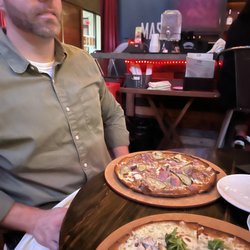 Ember - There are two pizzas in this picture. One is Fredo and the other one is Cuban with a Cauliflower crust. They were delicious!