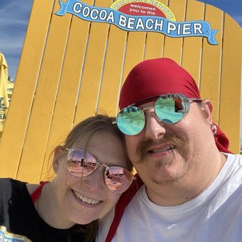 Rikki Tiki Tavern - Cocoa beach pier photo op in front of the pier. - Tiki Bars Near Me - Cocoa Beach, Florida