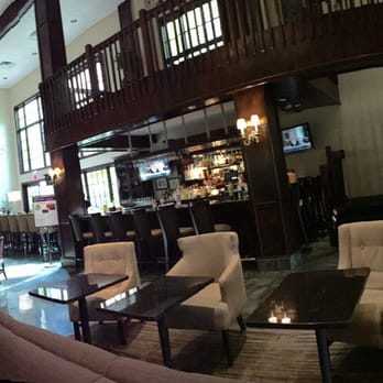 Hampton Inn & Suites Fairfield - Partial view of its spacious, inviting bar and lounge area. Yes, there's a piano here!  10.10.15 - Hotels Near Me - Fairfield, New Jersey