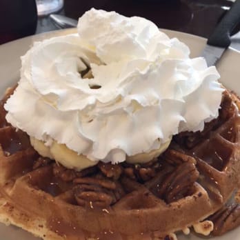 Benedict's Restaurant - Amazing Caramel Pecan Waffles with a little whip cream on top!! - New American Near Me - Dunedin, Florida Benedict's Restaurant - Amazing Caramel Pecan Waffles with a little whip cream on top!! - New American Near Me - Dunedin, Florida