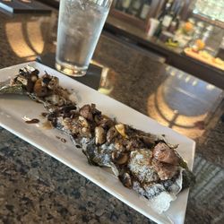 Fifth Avenue Bistro & Bar - Bakes mushrooms