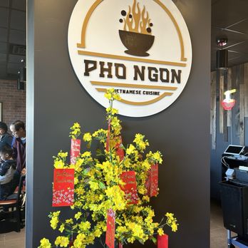 Pho Ngon - a potted plant with yellow flowers - Vietnamese Near Me - Norristown, Pennsylvania