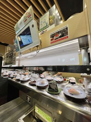 Kura Revolving Sushi Bar by null